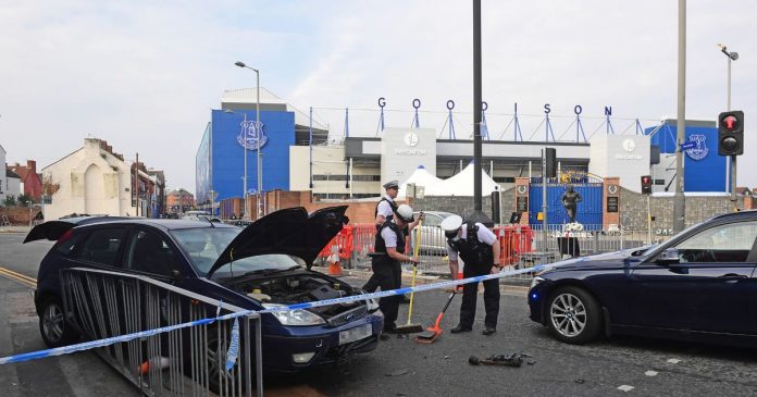 Crash closes the road after motorcycle and car collapse outside Goodison Park

