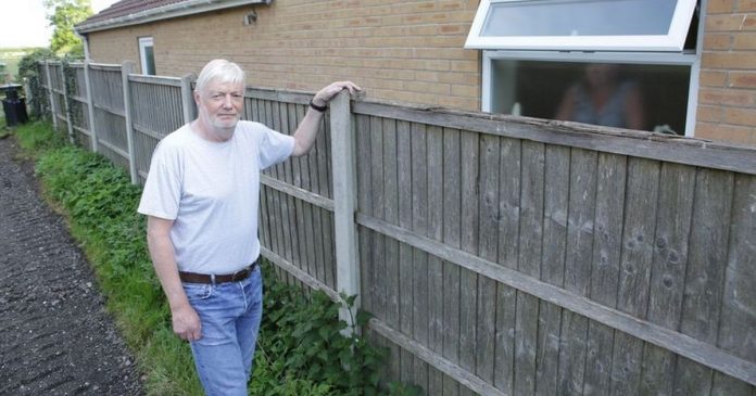 Man angry after waking up to find parking space being built next to his house

