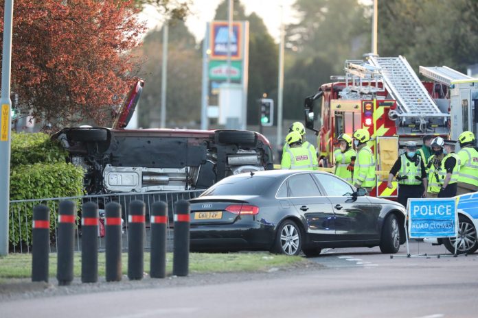 Car tips on its side near busy Dundee roundabout

