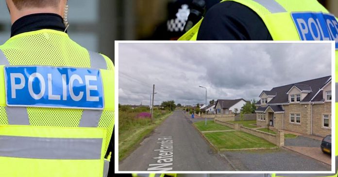 Police investigate car that was set on fire in Lanarkshire village while residents were sleeping inside

