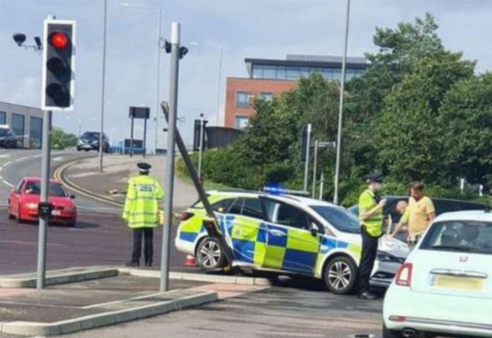 Police car damaged in accident at the intersection of Beaver Road and Victoria Road in Ashford

