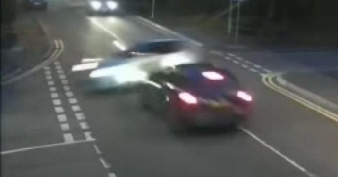 Shocking CCTV shows the car tipping and plowing into the wall during a high-speed police chase

