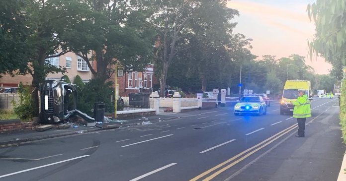 After an accident, the car ends up on the side next to the bus stop

