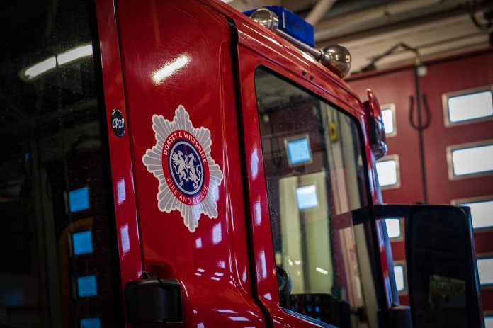 Rescue workers in an accident involving two cars in Old Sarum

