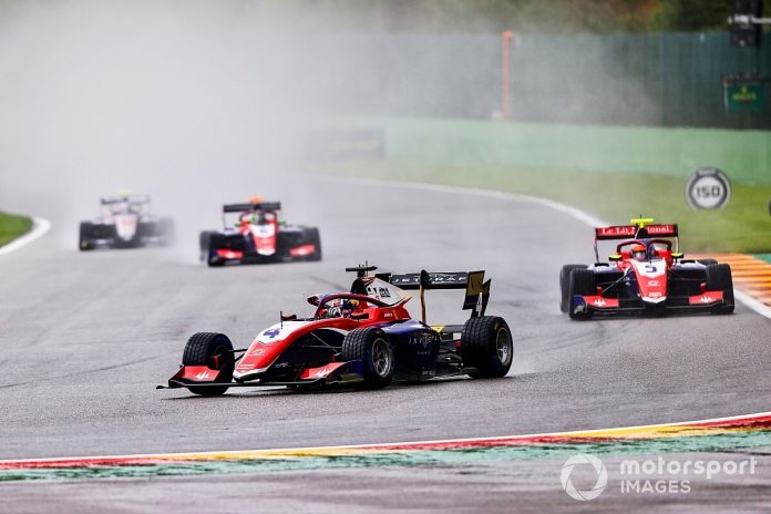 Doohan holds Schumacher back to win the finishing behind the safety car

