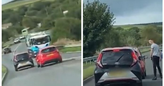 Road rage driver rattles car before he steps on the brakes and confronts motorists inside

