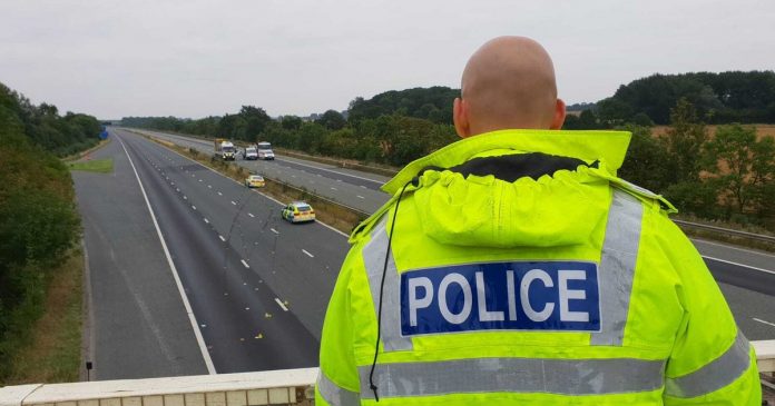 Police at the scene of a serious crash on the M62, understood to have involved a police car. The motorway was closed in both directions between junctions 34 and 35 after the crash, which happened just before midnight on Friday September 3