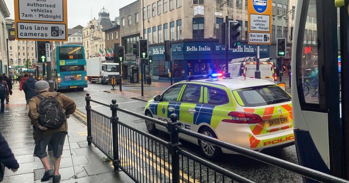 Police on Handover street following a crash