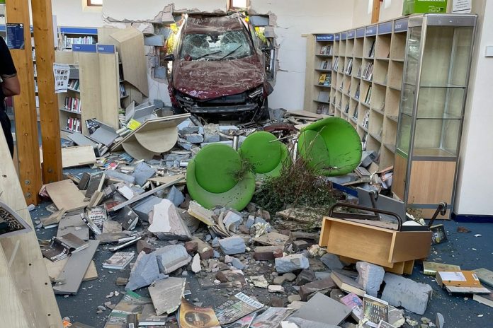 Car smashes the wall of the Southampton library, leaving two people locked up

