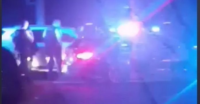The footage shows the police crashing into a car and lighting an area like 