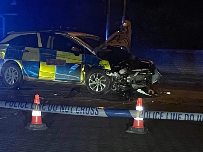 Man killed in police car crash

