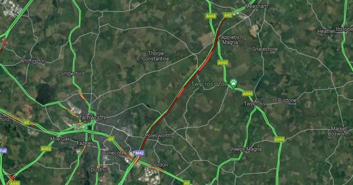 An overturned car and subsequent lane closure caused nine-mile queues to form on the M42 southbound in Warwickshire