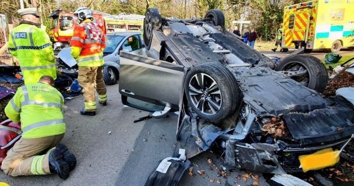 Shocking photo shows overturned car as woman taken to hospital following crash in Ewshot
