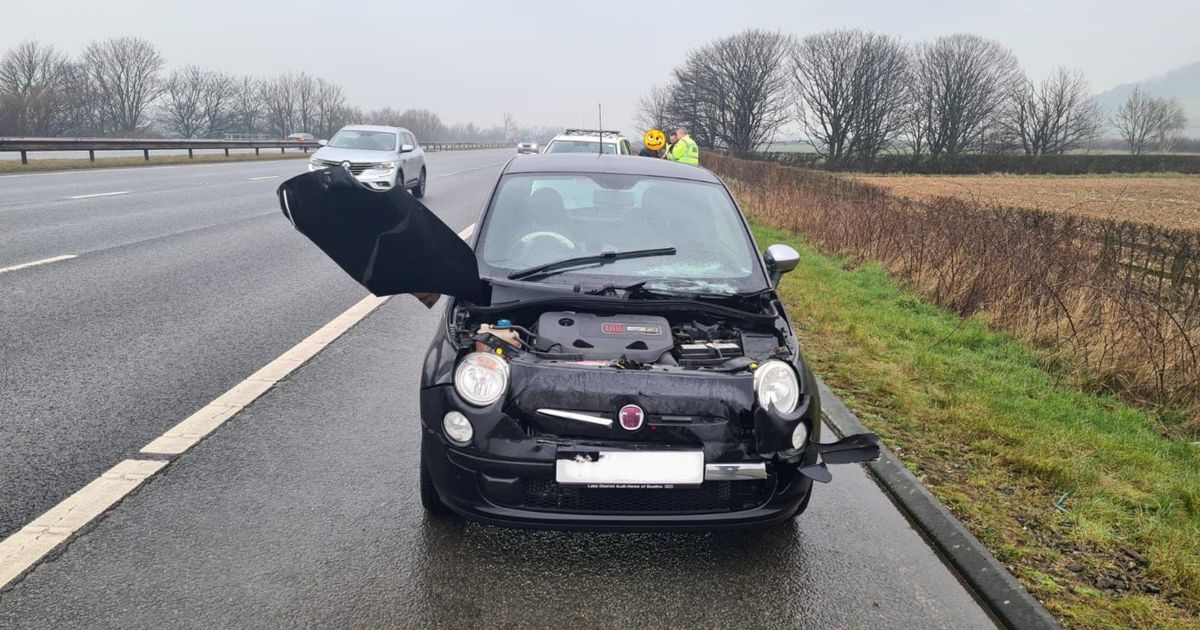 Drink driver takes car for motorway spin with bonnet hanging off
