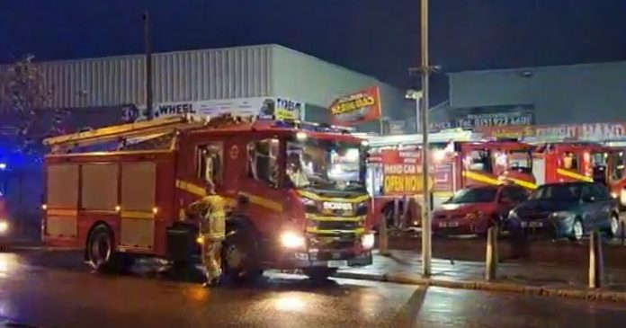 People urged to avoid area after fire breaks out at car wash
