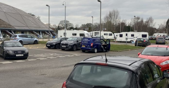 Travelers arrive in car park of Scunthorpe leisure centre
