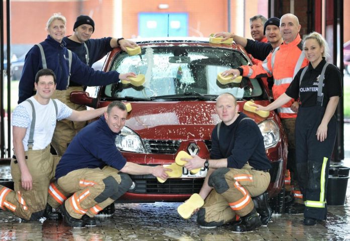 Charity car wash in Farnworth in support of Ukraine
