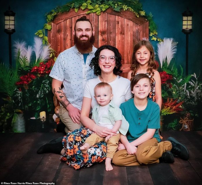 The shots, snapped Saturday, show Ohio man Xavier Brown, 25, and fiancée Muriel Michael, 28, posing with their family less than 10 hours before a crash claimed their lives