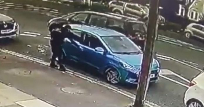 Brave pensioner dragged under car door and left in gutter as she tries to fight off thief
