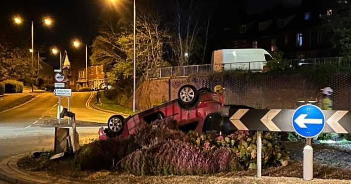 Car lands upside down on roundabout in Redditch
