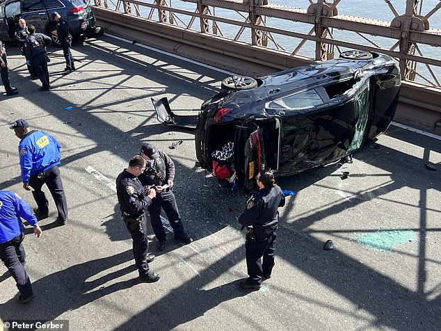 New York City police officers were on the scene of the Brooklyn Bridge Saturday afternoon to assess the damage from a multi-vehicle crash
