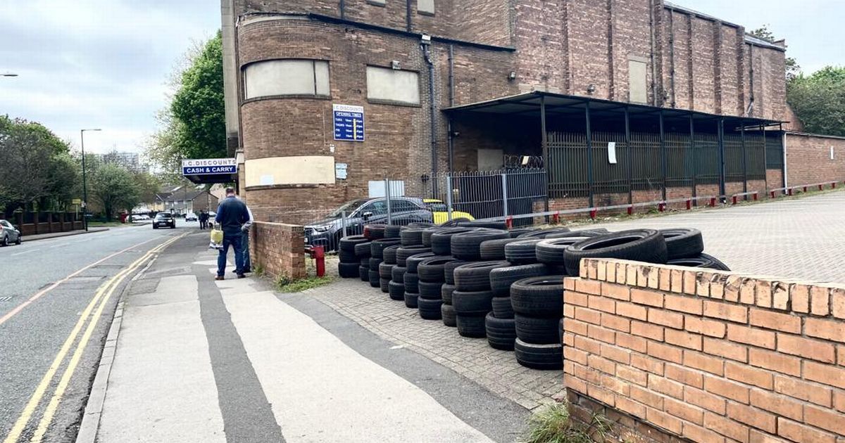 Mystery as tires piled up to make barrier at St Ann's car park
